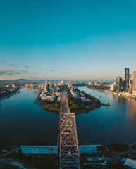 Sunrise aerial shot of Brisbane, the Story Bridge and the Brisbane River