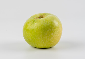 Green juicy apple isolated on white background, clipping path. Fresh green apple isolated on white backgroun