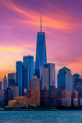Fototapeta premium New York City Manhattan downtown skyline at dusk with skyscrapers over Hudson River, USA