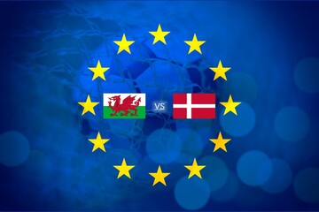 Florence, Italy, June 24th 2021, European flag with the soccer ball inside the net, with the flags of Wales versus Denmark. Final round of 16.