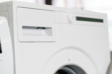 Close up of new dryer machine in household appliances store
