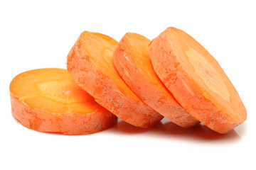 Fresh sliced carrot on a white background