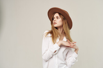 attractive woman in white shirt wearing hat decoration fashion modern style