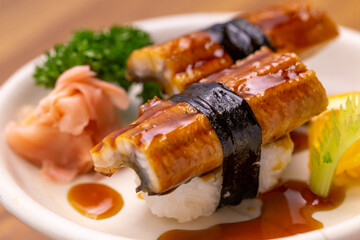 japanese unagi nigiri sushi set on plate. 