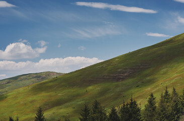 Clouds over the mountains. Sunny day in the mountains. Ukrainian Carpathian mountains. Svidovec...
