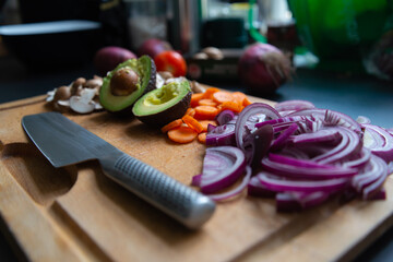 Side View of Vegetables on Wooden Board with Knife. Kitchen Concept. Vegan Concept