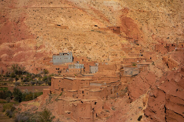 mud brick villages in the High Atlas mountains with a few trees in the valley