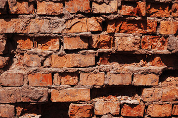 Broken Red Wall Background. Old brick wall texture.