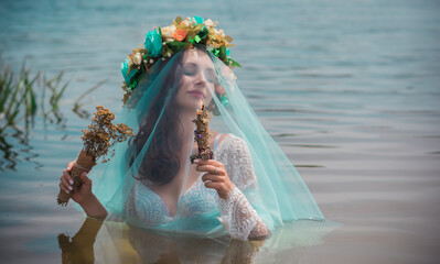 Bride making magic of candles, magical attributes, herbs and flowers, Slavic/ Wicca rituals and...