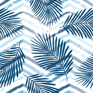 Tropical pattern, palm leaves seamless vector floral background. Exotic plant on blue chevron stripes print. Summer nature watercolor zigzag lines jungle print