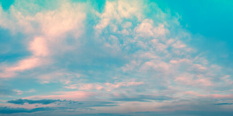 Colorful cloudy sky at sunset. Gradient color. Sky texture, abstract nature background. Poster Banner. Copy space. Sky panorama