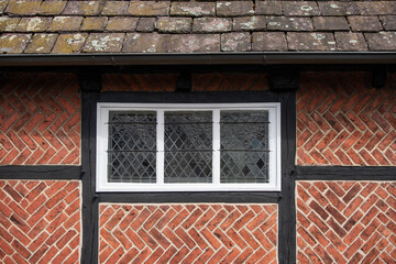 Old vintage brick wall and window