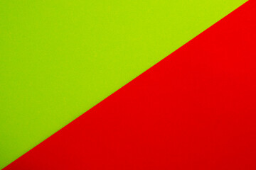 Obraz premium Green and red paper split half background use for background,wallpaper concept.