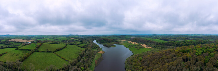 Fototapeta na wymiar Aerial Panoramic view of summer cloudy quoile river countryside, Northern Ireland