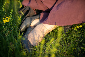 Female feet on the fresh green grass