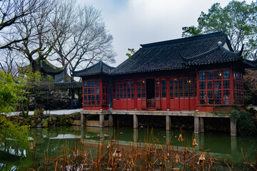 red wooden wall pavilion in the Suzhou garden, interesting place to visit , travel, rest, meditation
