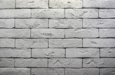 Brick wall is painted with gray paint. Abstract texture for background.