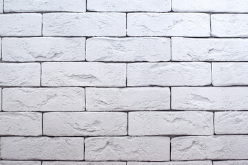 Brick wall is painted with gray paint. Abstract texture for background.