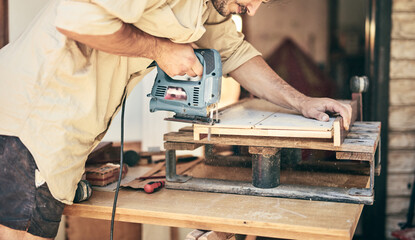 Man assembling furniture and fixing it - hobby concept.