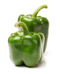 fresh green bell pepper (capsicum) on a white background