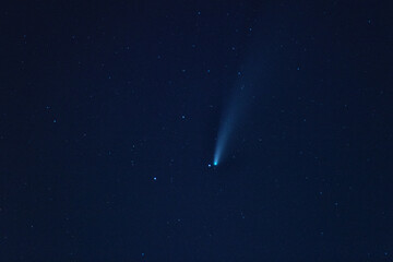 Comet Neowise in the night starry sky, amazing natural phenomenon, scientific background