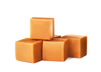 Heap of caramel candies on white background