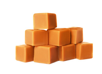 Heap of caramel candies on white background