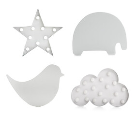 Set with different cute child's night lamps on white background