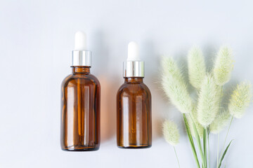 Glass brown dropper bottle mockup top view