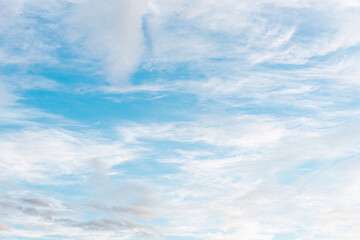 Abstract blue sky with clouds no focus blurred background wallpaper