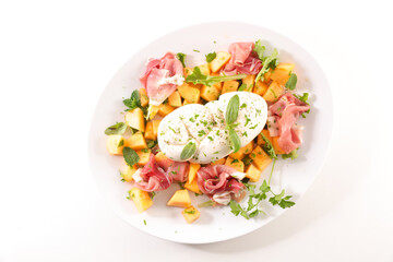 summer salad with melon, prosciutto ham and mozzarella