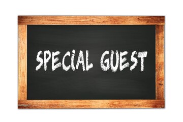 Obraz premium SPECIAL GUEST text written on wooden frame school blackboard.