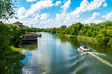 Obraz premium Embankment of the Tsna River in Tambov. View on flow Tsna river in Tambov city