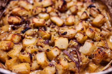 vegan potato roast with onions and airy-free cream, healthy plant-based food