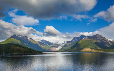 Landscape with fjord, mountains and glacier in northern Norway