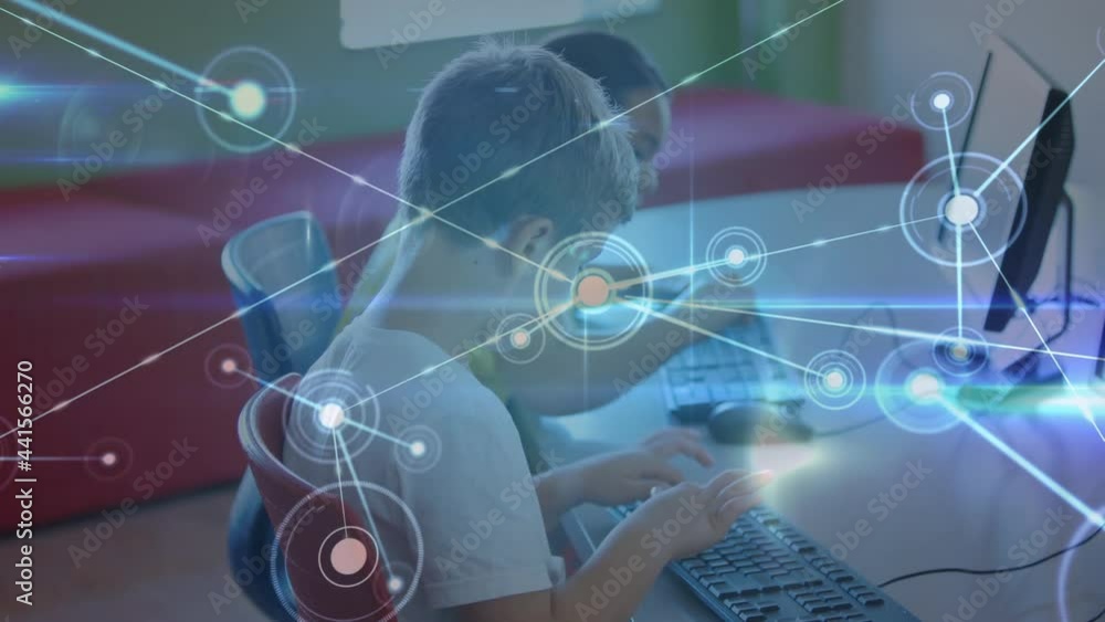 Aufkleber glowing network of connections against caucasian boy using computer at school