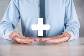 Businessman, man hold in hand offer positive thing such as profit, benefits, development, CSR...