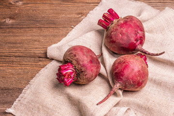 Fresh beetroots on a vintage wooden table
