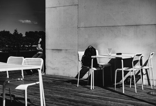 open air cafe, monochrome photography, urban environment