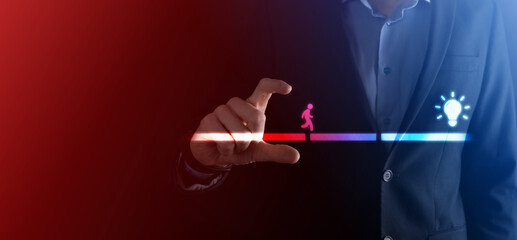 Male business man hand hold a connecting block between two sets of bridge road for a silhouetted man to walk idea icon.