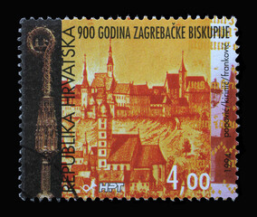 A stamp printed in Croatia shows Bishop's crosier and view of Zagreb by Valvasor, 900th...