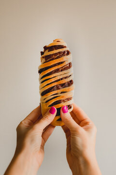 Hand of woman holding azuki bun