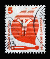Stamp printed in Germany showing Motive for accident prevention, Security at all times, Human in a...