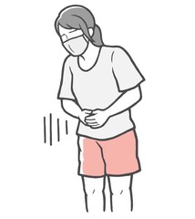 マスクをして、お腹に手をあてる腹痛の若い女性