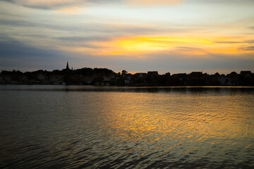 Fototapeta premium View to the island town Malchow during sunset, Mecklenburg Western Pomerania - Germany