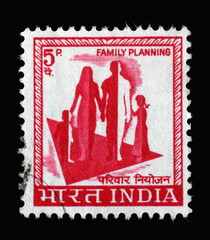 Stamp printed in India shows silhouette of a family to commemorate family planning campaign, circa 1967