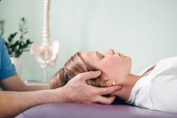 A girl receiving CST treatment. Osteopathic Manipulation and CranioSacral Therapy for children and...