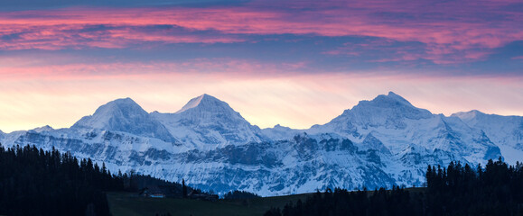 Eiger Mönch and Jungfrau at sunrise on a winter morning