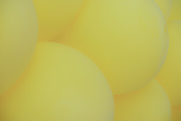 Background from yellow balloons. Blurred Photo of balloons for background.