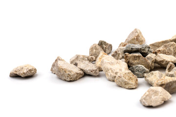 Gray small rocks ground texture isolated on white background. Small road stone.